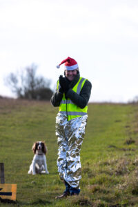 Volunteers brave the cold to cheer runners on at the 3rd Annual Lewes Downland Santa Run | Lewes Athletic Club